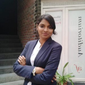 Yasmin Fathima, a student of immersion program squad #1, 2017 batch, smiling at the camera in professional attire.