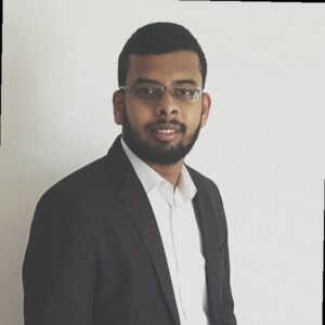 Mouhamad Youssouf, a student of immersion program squad #1, 2017 batch, smiling at the camera in professional attire.