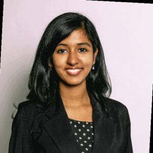 Sanjana Kripa Babu, a student of immersion program squad #2, 2018 batch, smiling at the camera in professional attire