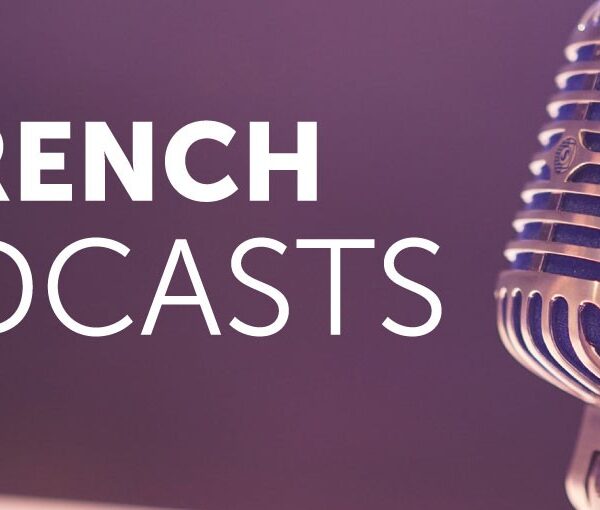 Vintage microphone with the words ‘French Podcasts’ on a purple background, representing HERE AND NOW’s audio tools for learning French.